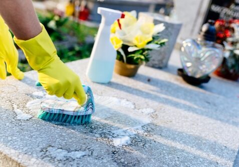 woman-cleaning-st.-charles-monuments